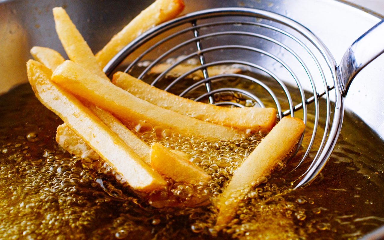 cooking-french-fries-close-frying-fryer-shutterstock_464044346.jpg