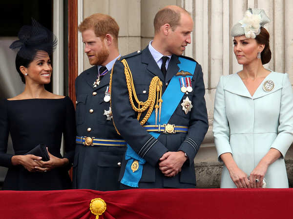 l-r-meghan-markle-pricne-harry-prince-william-and-kate-middleton-on-the-balcony-of-buckingham-palace-as-they-watch-a-fly-past-to-mark-the-centenary-of-the-royal-air-force-in-central-london-in-2018-.jpg