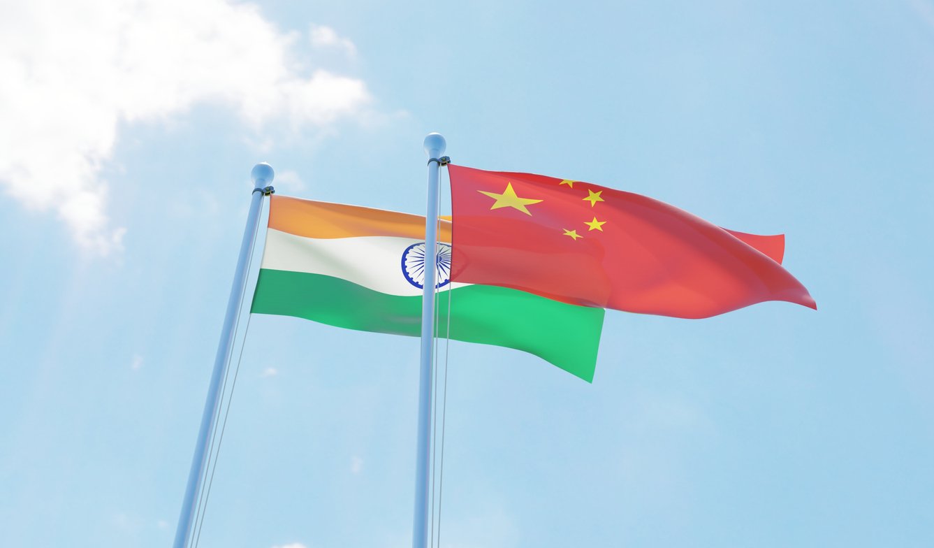 india china flag istock-1594316021.jpg